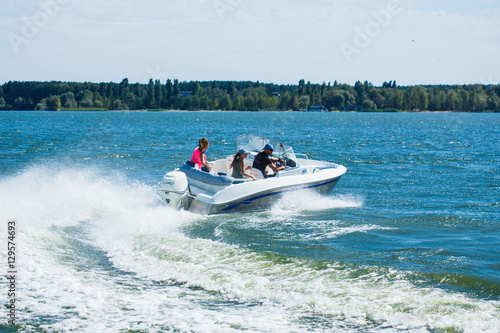  Girls ride on the boat to drift © Sergey