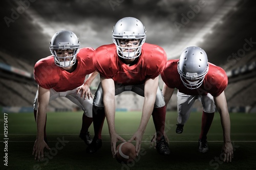 Composite image of american football players 3D