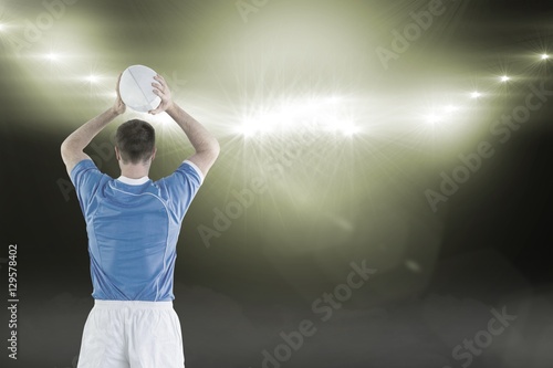 Composite image of rugby player about to throw a rugby ball 3D