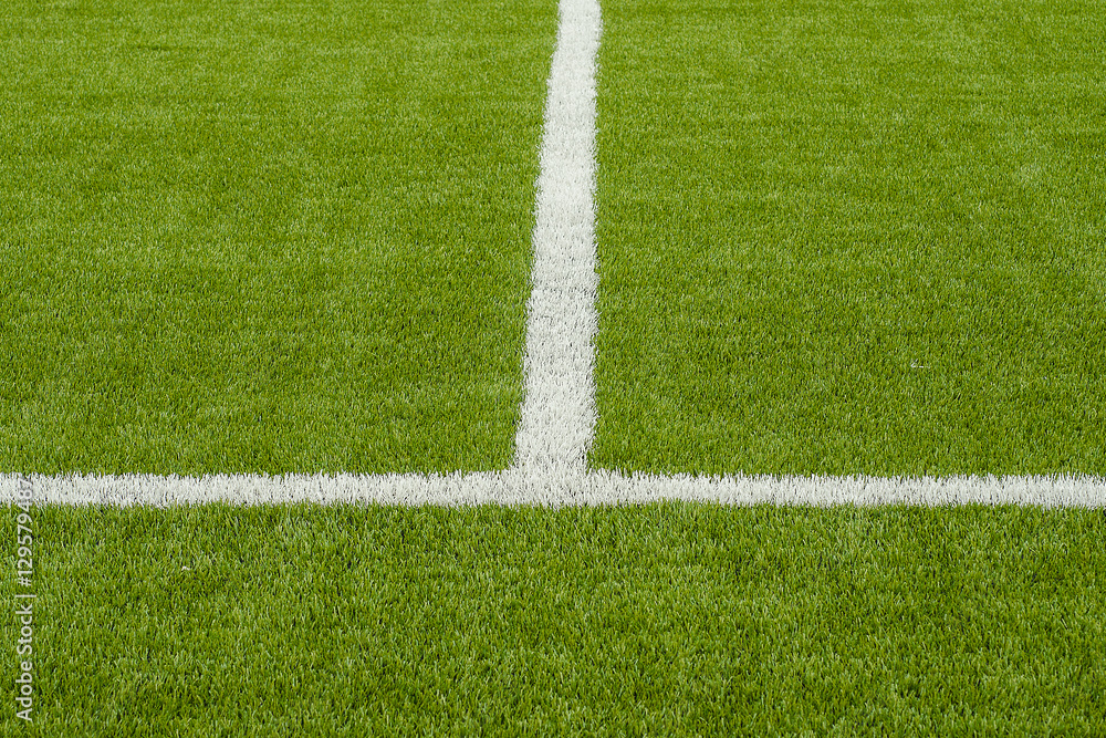 The white Line marking on the artificial green grass soccer field The white Line marking on the artificial green grass soccer field