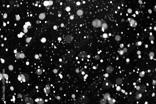 Real snow on black background