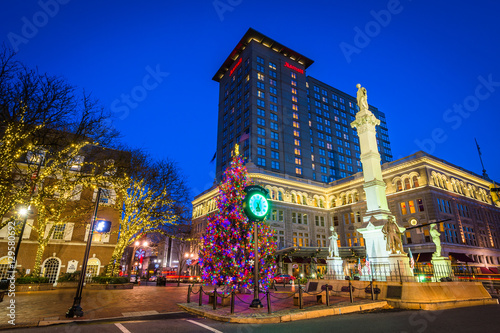 Christmas tree and buildings at Penn Square at night, in Lancast photo