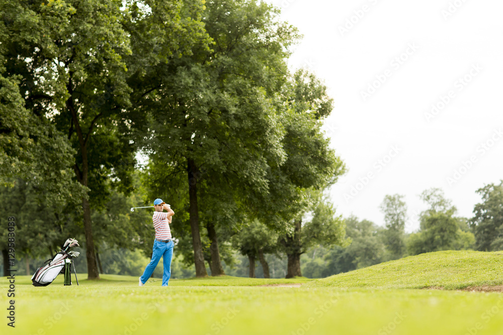Fototapeta premium Golfer playing on beautiful golf course