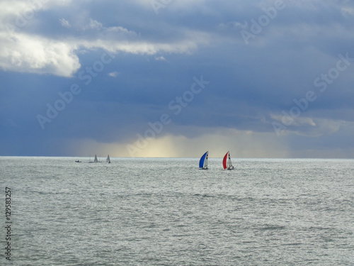 Sailing boats in the sea, sky with clouds © lana4ka