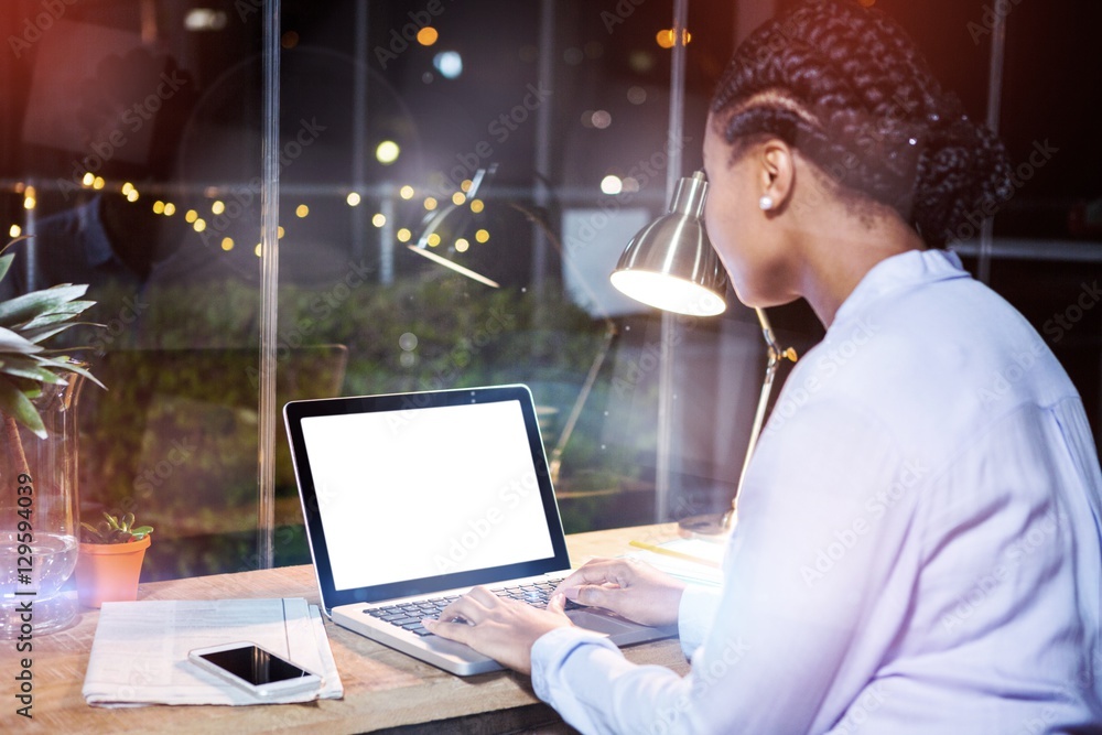 Businesswoman working on laptop Businesswoman working on laptop