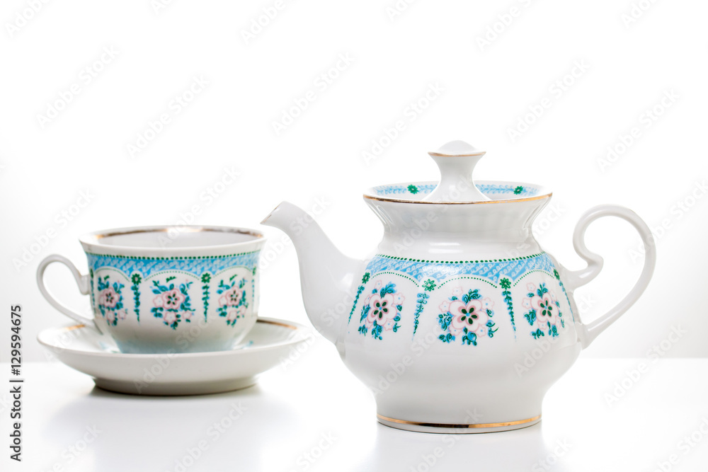 Ornamental tea set. Porcelain dishes.Tableware. Kitchenware. Decorative background. Ornamental tea set. Porcelain dishes.Tableware. Kitchenware. Decorative background.