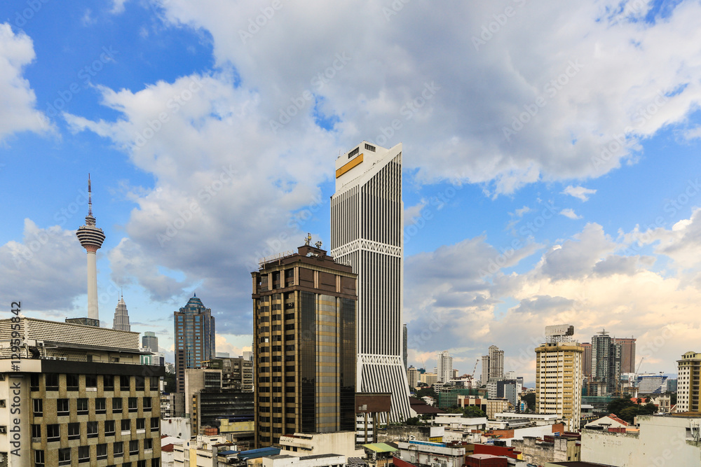 Naklejka premium Sunset over Kuala Lumpur skyline in Malaysia capital city.