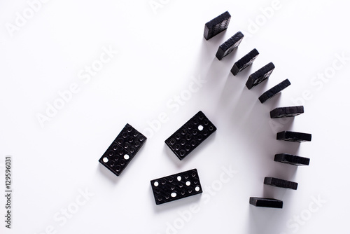 Dominoes on white surface