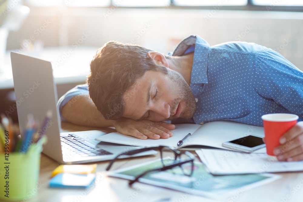 Male business executive sleeping Male business executive sleeping
