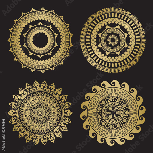 Gold color round abstract ethnic ornament mandalas