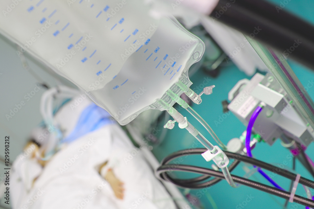 Plastic bag with medical solution on the backgeound of patient Plastic bag with medical solution on the backgeound of patient