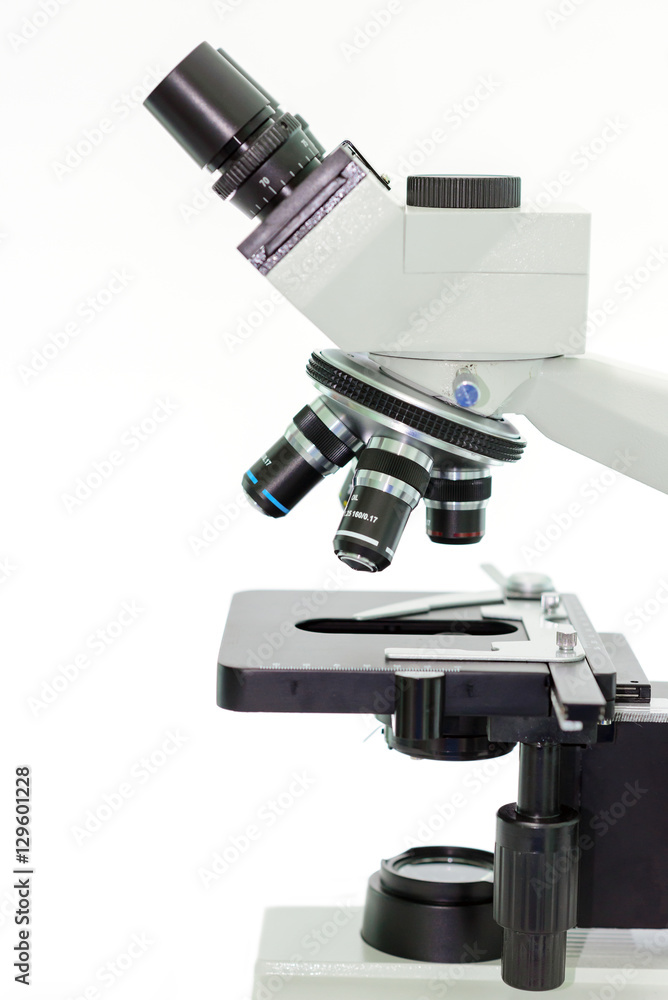laboratory microscope with stereo eyepiece isolated on a white background laboratory microscope with stereo eyepiece isolated on a white background
