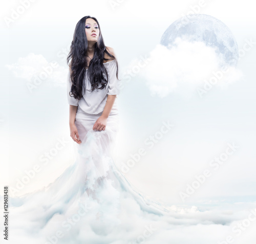 Model posing over fantasy background