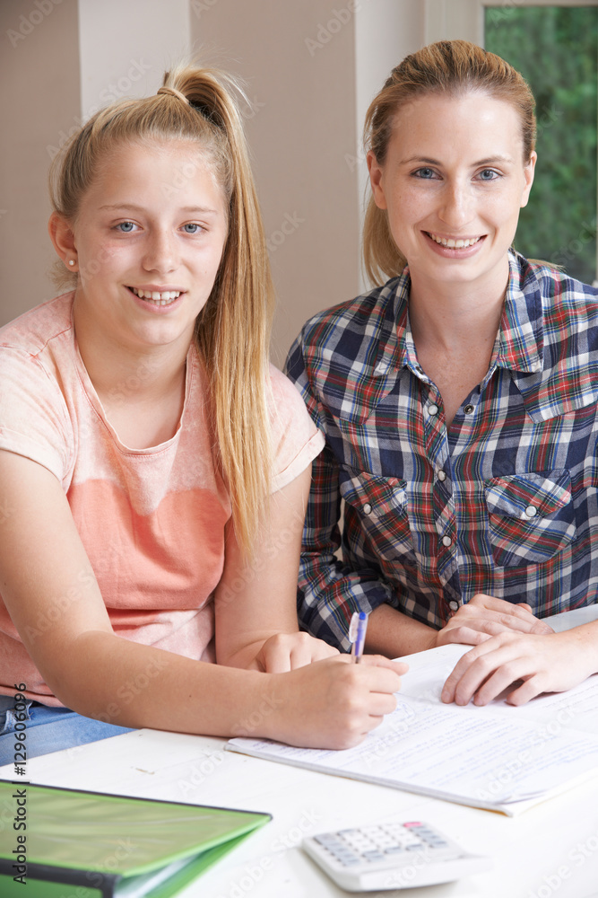 Female Home Tutor Helping Girl With Studies Female Home Tutor Helping Girl With Studies