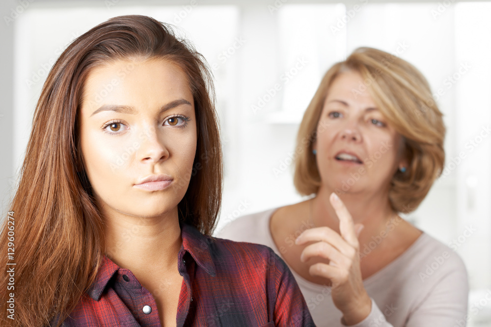 Bored Teenage Girl Being Told Off By Mother Bored Teenage Girl Being Told Off By Mother