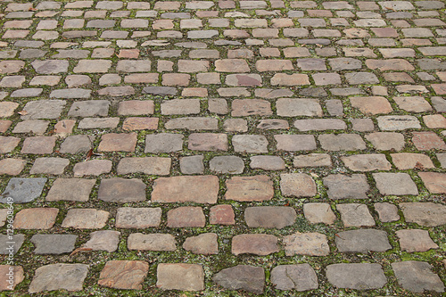 Texture - a pedestrian street lined with cobblestone of unusual shape