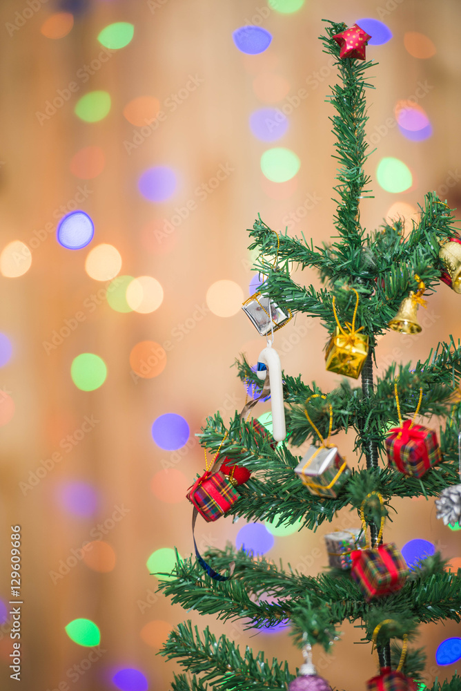 Christmas tree and gift boxes,on bokeh background
