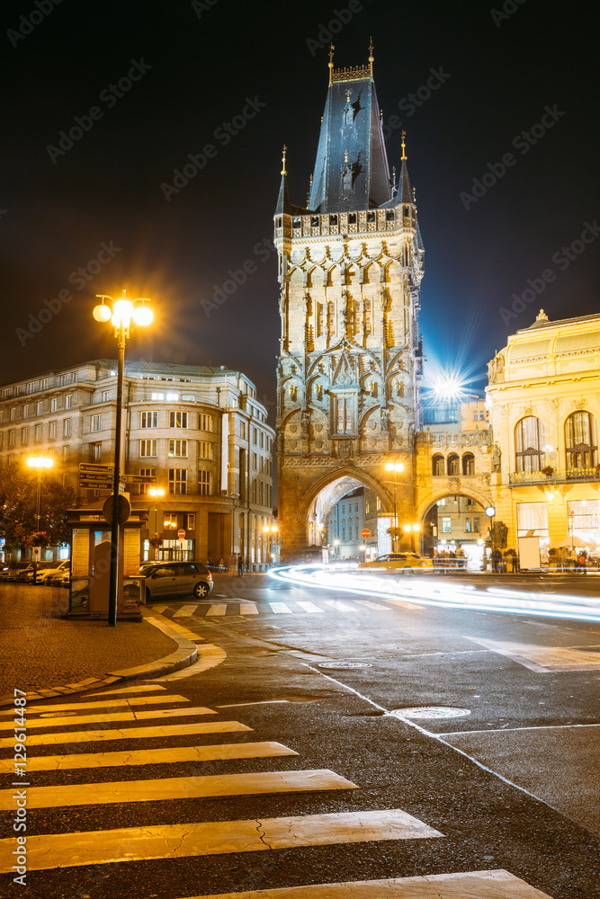 Fototapeta premium Night View Of The Powder Tower Or Powder Gate. This Landmark Is 
