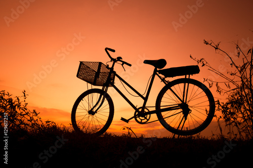 Old Bicycle silhouette at sunset, Landscape picture Bike at suns