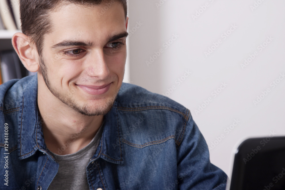 closeup and portrait of man young casual with the computer laptop closeup and portrait of man young casual with the computer laptop