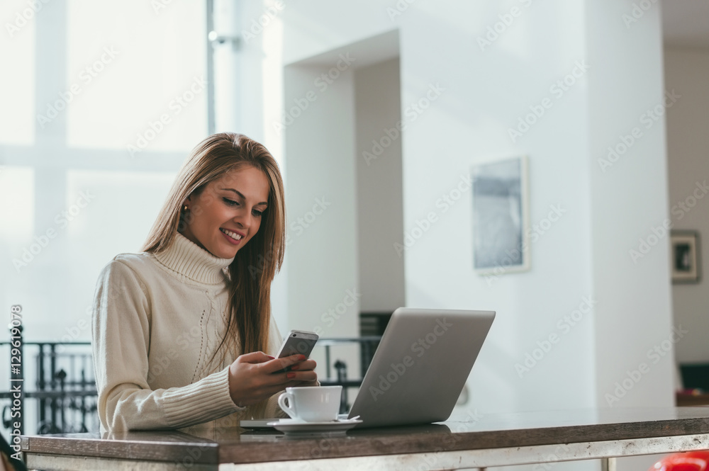 Portrait of beautiful young woman working in the office. Portrait of beautiful young woman working in the office.