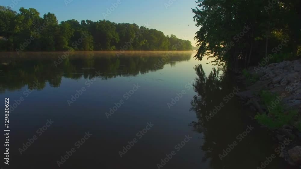 Peacefully gliding over foggy river through swarms of insects.
Peacefully gliding over foggy river through swarms of insects.