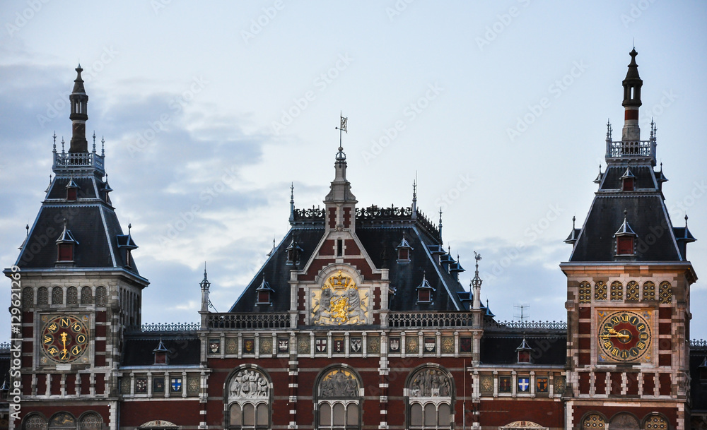 View of Amsterdam Central Station at sunset, Holland