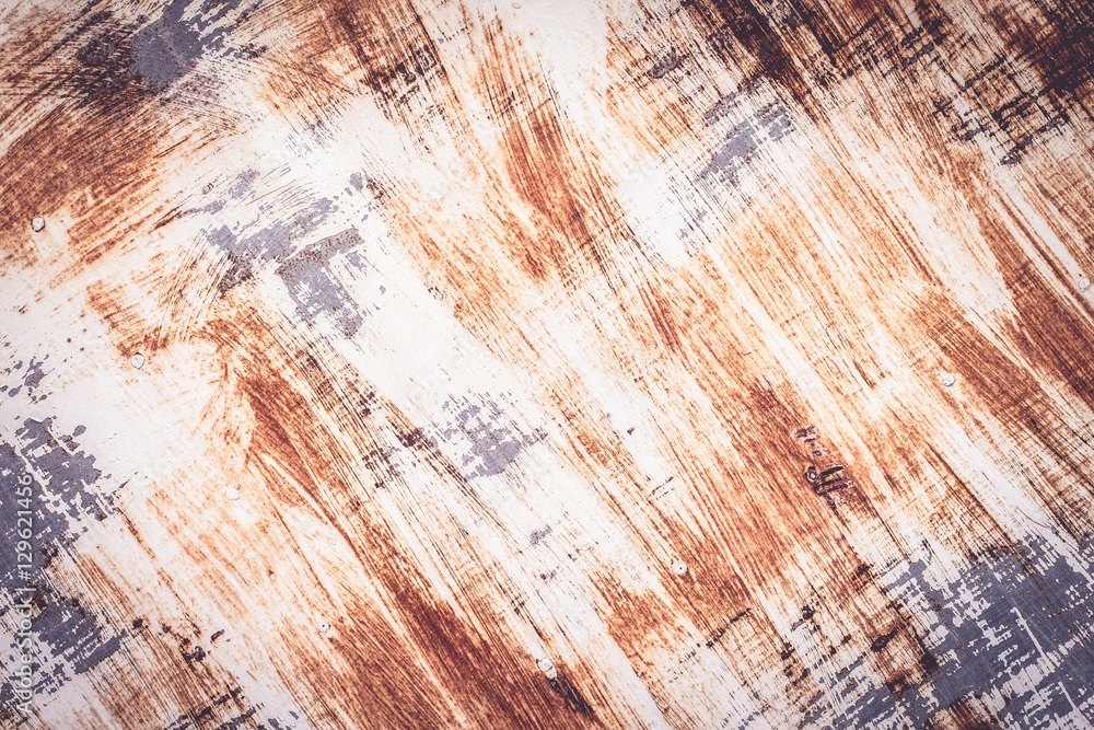 Naklejka premium A background of peeling paint and rusty old metal