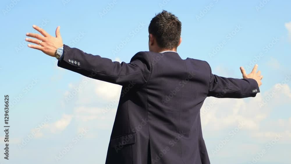 young businessman enjoying for the reached success young businessman enjoying for the reached success