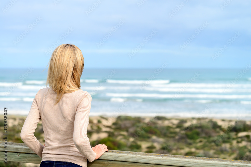 Woman enjoying the sea view at Goolwa beach Woman enjoying the sea view at Goolwa beach
