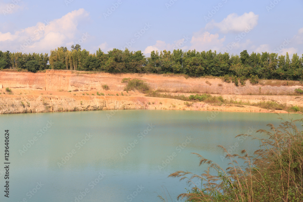 orange valley hill and green water pond lake