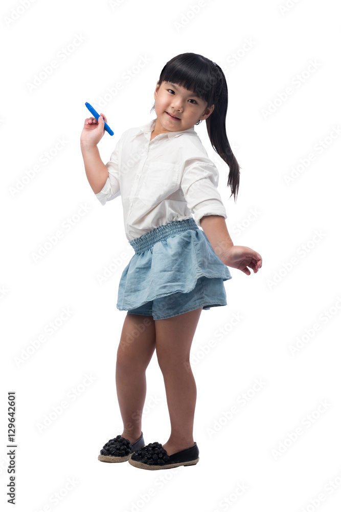 Happy Asian little girl writing on empty screen,isolated with clipping path. Happy Asian little girl writing on empty screen,isolated with clipping path.