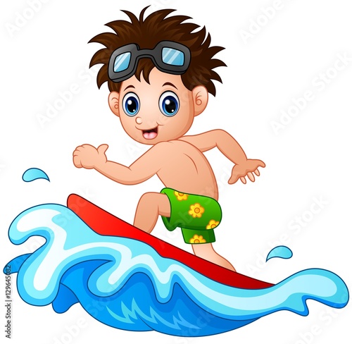 Little boy surfing on a big wave