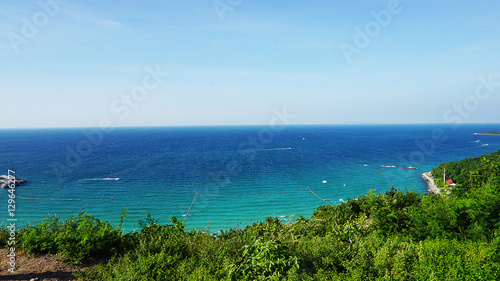 Sea view from tropical beach with sunny sky. Summer paradise bea