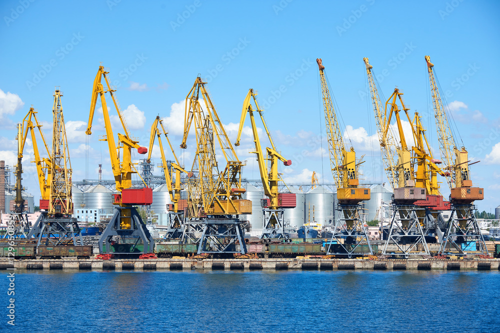 industrial sea port and cranes, railways, warehouses