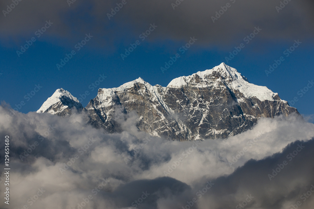 A view of Taboche through the clouds seen from Kongde in the Everest region, Nepal, Himalayas