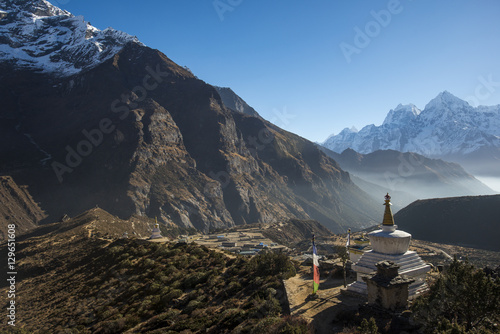 A view from Thame monastery looking down the Thame valley with Thermserku and Kantega peaks in the distance, Khumbu Region, Nepal, Himalayas photo
