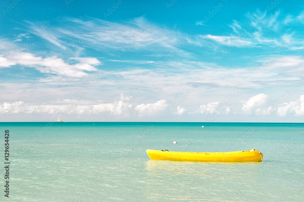 Yellow boat on water Yellow boat on water