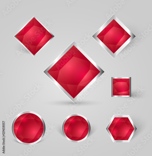 collection of shiny silver badges with red crystals and shadows