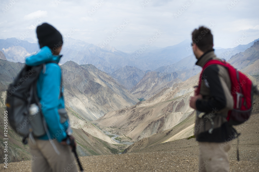 Stopping to savour the views from the top of the Konze La, 4900m, during the Hidden Valleys trek, Ladakh Stopping to savour the views from the top of the Konze La, 4900m, during the Hidden Valleys trek, Ladakh