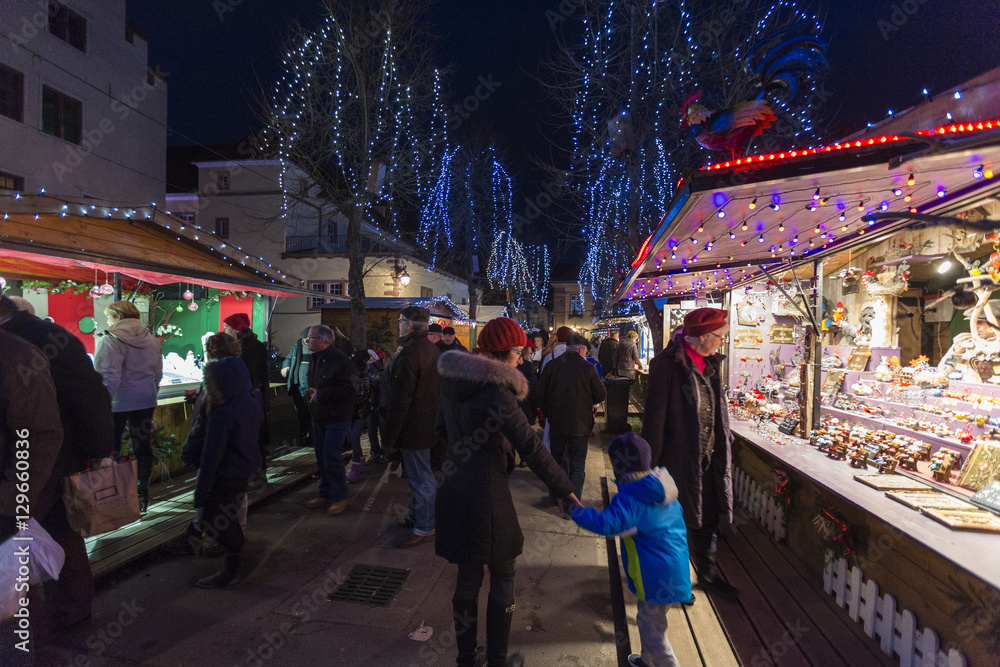 Tourists and Christmas Markets in the old medieval town of Riquewihr, Haut-Rhin department, Alsace, France Tourists and Christmas Markets in the old medieval town of Riquewihr, Haut-Rhin department, Alsace, France