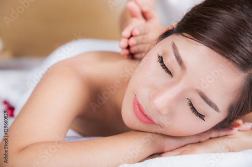 The girl relaxes in the spa salon