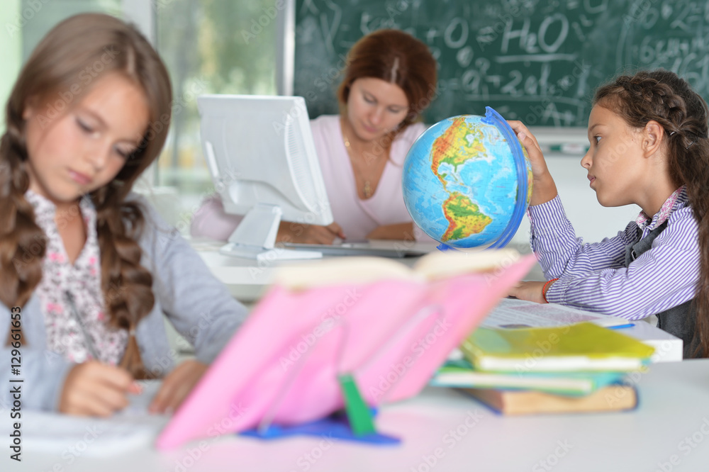 teacher with two girls at lesson teacher with two girls at lesson