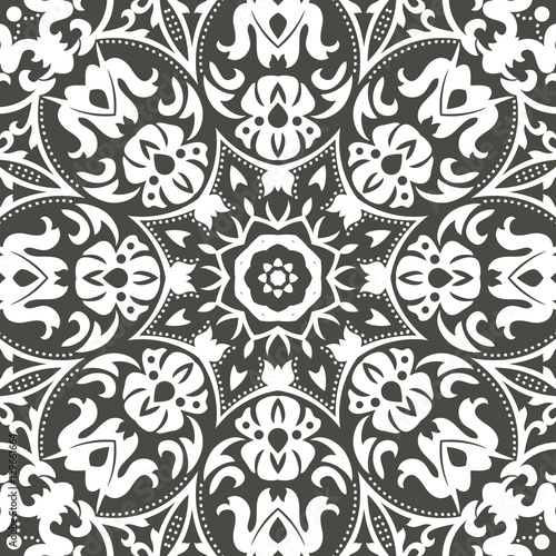 Mandala seamless floral pattern with flowers and leaves. Coloring, white and black. Seamless pattern. Doodle lace mandala. Vector illustration.