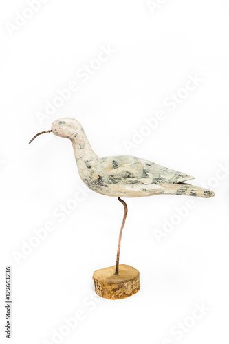 vintage wood carved Whimbrel bird isolated on white background
