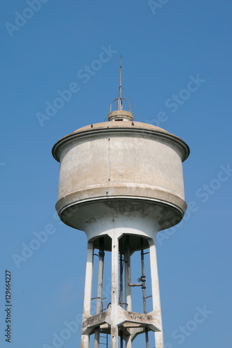 Water tank and blue sky background