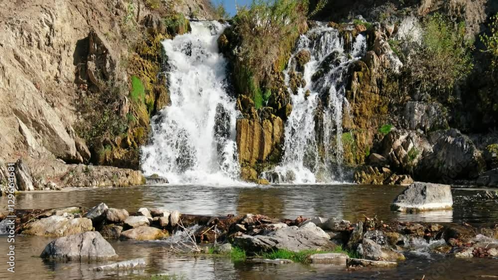 Waterfall and rocks on river Vydriha near village Belovo in Novosibirsk region, Siberia, Russia Waterfall and rocks on river Vydriha near village Belovo in Novosibirsk region, Siberia, Russia