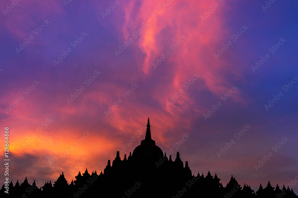     silhouette sandstone pagoda in wat Pa Kung temple at Roi Et of Thailand on twilight sunset 