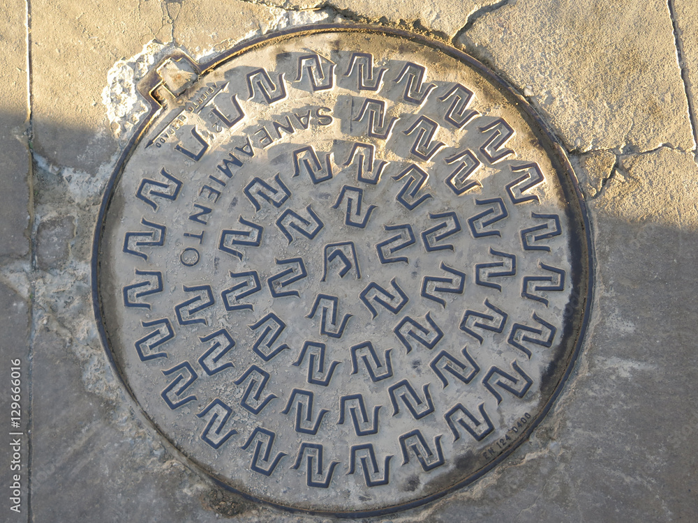 cast iron pattern on manhole cover