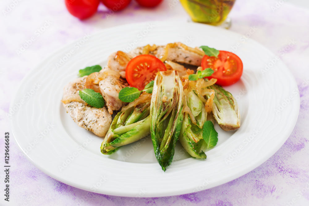 Baked chicory with chicken, onions and herbs. Baked chicory with chicken, onions and herbs.